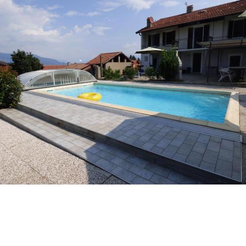 Attractive holiday home in Castellveccana with private pool