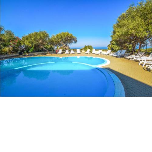 Awesome apartment in Badesi with Outdoor swimming pool and 1 Bedrooms