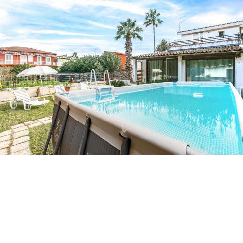 Awesome apartment in Siracusa with Outdoor swimming pool, WiFi and 2 Bedrooms