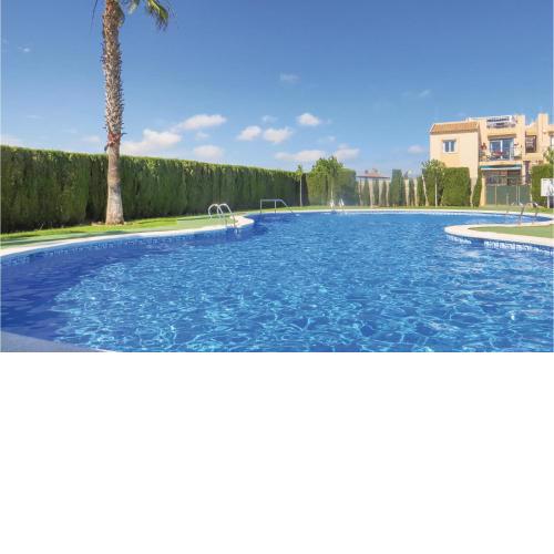 Awesome Apartment In Torrevieja With Wifi, Outdoor Swimming Pool And Swimming Pool