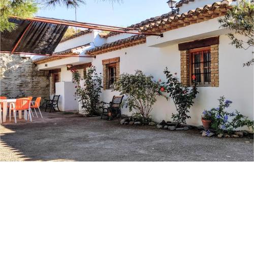 Awesome home in Baza with Outdoor swimming pool, WiFi and 2 Bedrooms