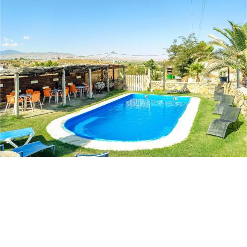 Awesome home in Baza with Outdoor swimming pool, WiFi and 3 Bedrooms