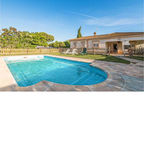 Awesome home in Chiclana de la Fronter with Outdoor swimming pool, Private swimming pool and 4 Bedrooms