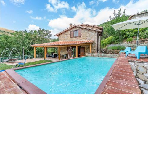 Awesome home in Gubbio -PG- with 2 Bedrooms and Outdoor swimming pool
