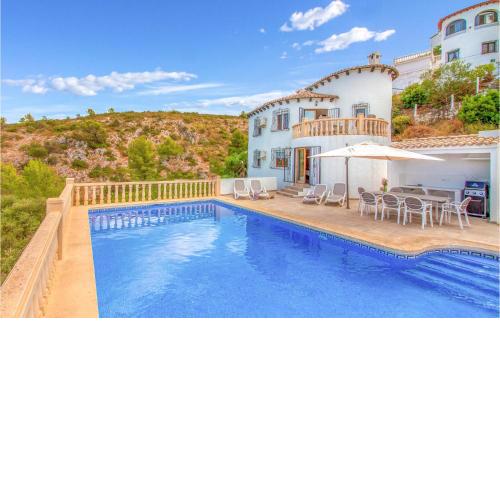 Awesome home in Pedreguer with WiFi, Swimming pool and 4 Bedrooms