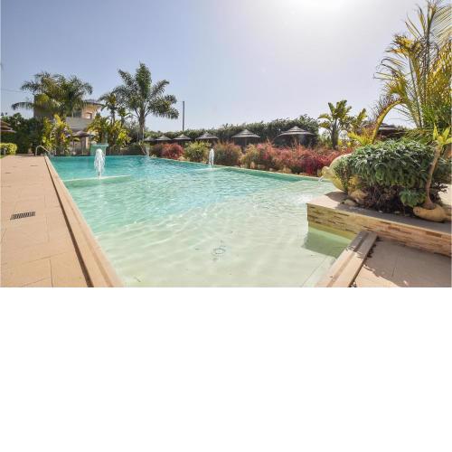 Awesome home in Pozzallo with Outdoor swimming pool, WiFi and 3 Bedrooms