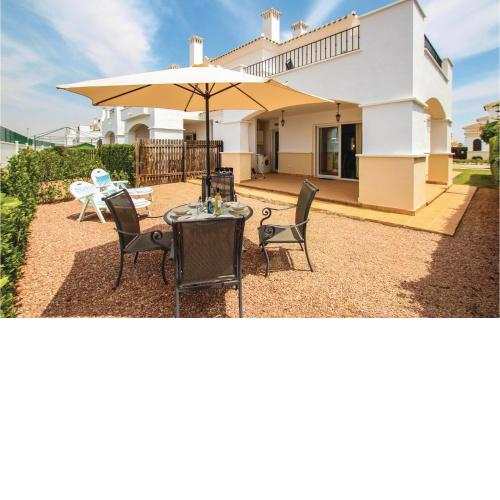 Awesome home in Roldn with 2 Bedrooms, WiFi and Outdoor swimming pool