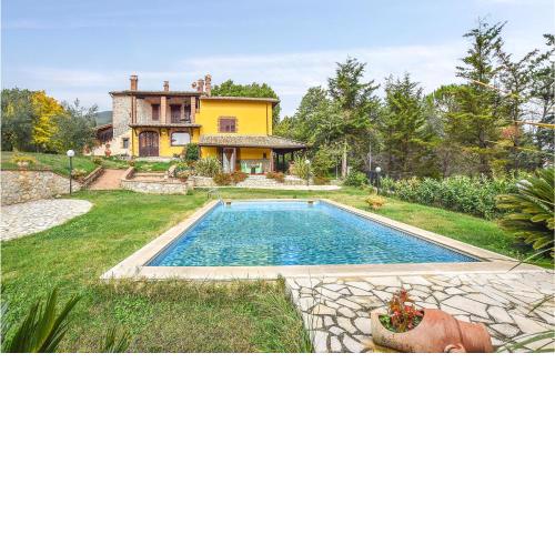 Awesome home in Santa Restituta with 6 Bedrooms, WiFi and Outdoor swimming pool