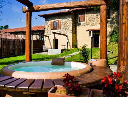 Baita nel Borgo Naturas con idromassaggio e giardino privati