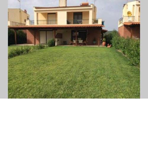 Beach house with garden in Fourka