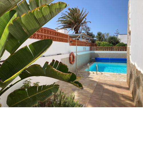 Beach house with the heated pool next to Rocky Point