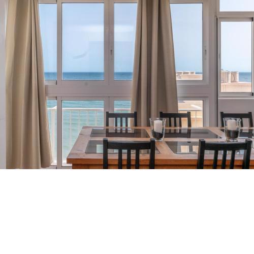Beachfront 2BR Apartment with Pool & WiFi