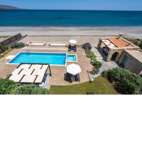Beachfront villa Turquoise with private pool, BBQ and ping pong table