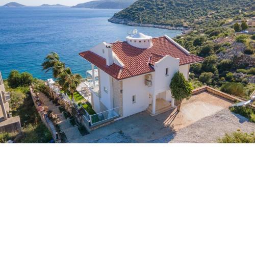 BEACHFRONT WHITE VILLA WİTH PRIVATE SWIMMING POOL