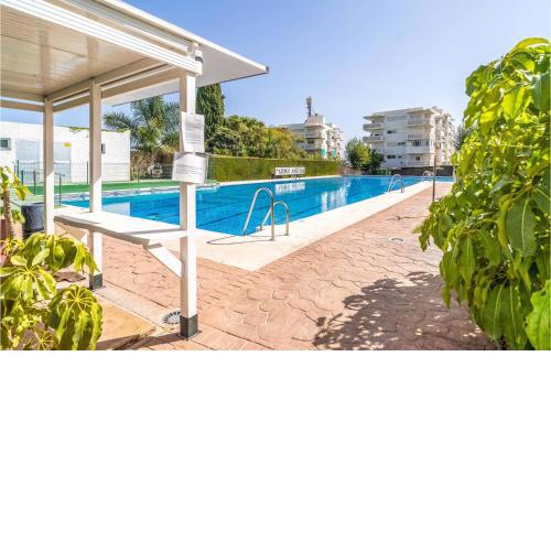 Beautiful apartment in Estepona with Outdoor swimming pool, WiFi and 3 Bedrooms