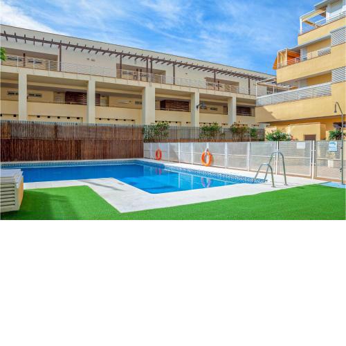 Beautiful apartment in Isla Cristina with Outdoor swimming pool, WiFi and 2 Bedrooms
