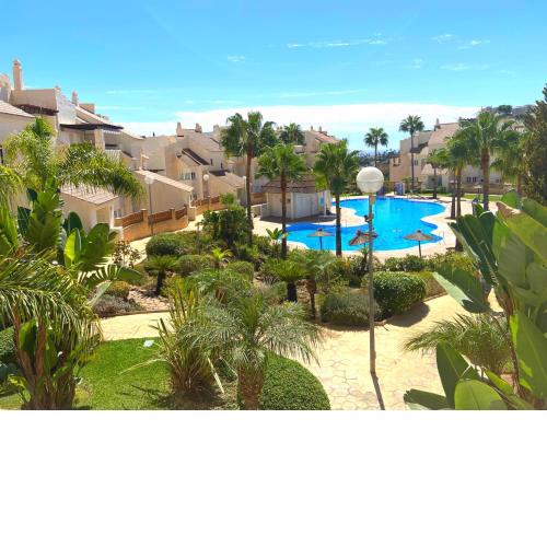 Beautiful apartment with pools, playground and paddle tennis - Family friendly and near Xanit Hospital - Free parking in garage
