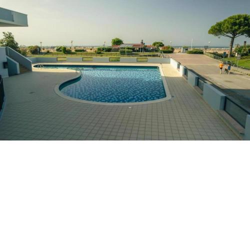 Beautiful apartment with terrace and swimming pool in Bibione