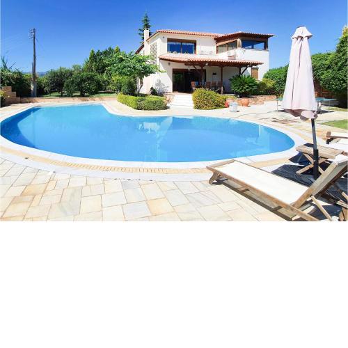 Beautiful home in Kiato with 5 Bedrooms, Sauna and Outdoor swimming pool