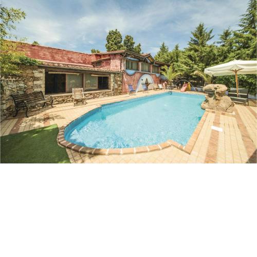 Beautiful home in Orgosolo NU with 2 Bedrooms and Outdoor swimming pool