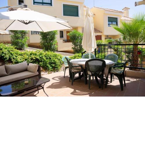 Beautiful Townhouse with views over the communal pool close to Campoamor Golf Course