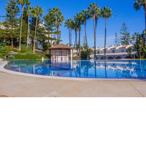 Benalgolf Lovely apartment in Benalmádena with Sea Views, Excellent WIFI connection, private Backyard with BBQ