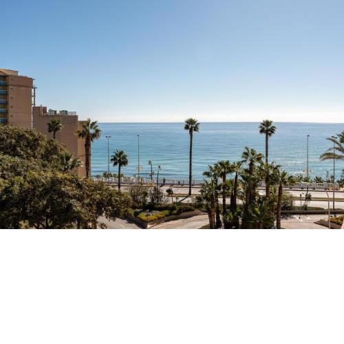 Benalmadena beachfront retreat big balcony and city sea views