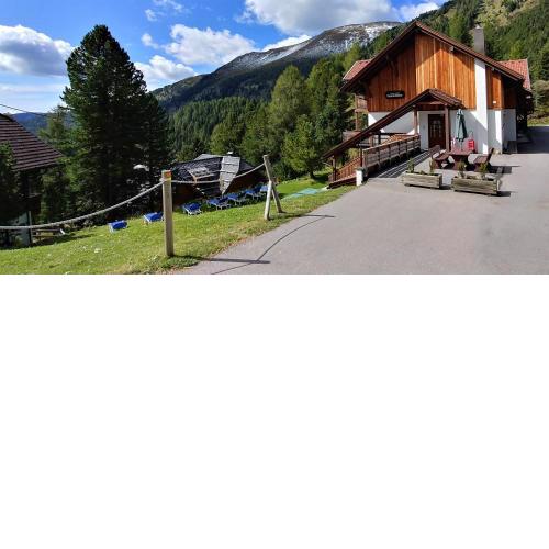 Bergheim Schmidt, Almhütten im Wald Appartments an der Piste Alpine Huts in Forrest Appartments near Slope