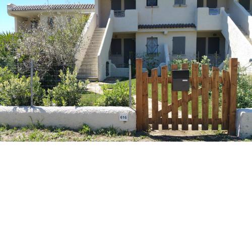 Bilocale con giardino privato, terrazza vista mare e incantevoli tramonti sul promontorio di Capo Testa - IUN Q2226