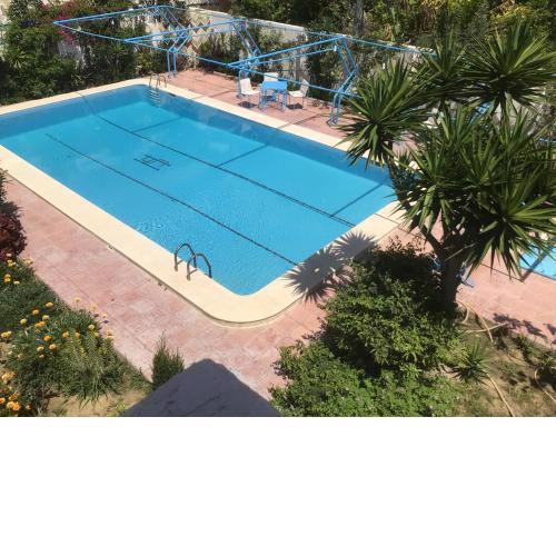 Blue family villa with large private pool