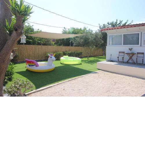 Brand new house with garden, next to the beach.