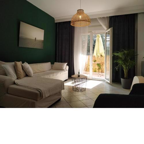 Bright Apartment steps from the Sea