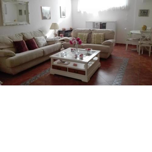 Bright apartment with bedroom, living room and private bathroom by the sea.