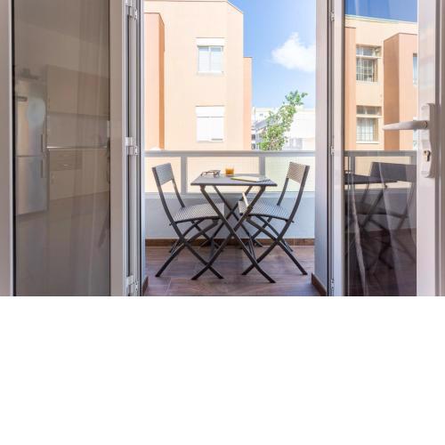 Bright with terrace next to the beach