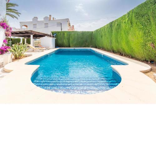 Bungalow 90m2, airco 2, Pool 5x10, Sandy Beach 200m, Wifi, Carport for 2 cars.