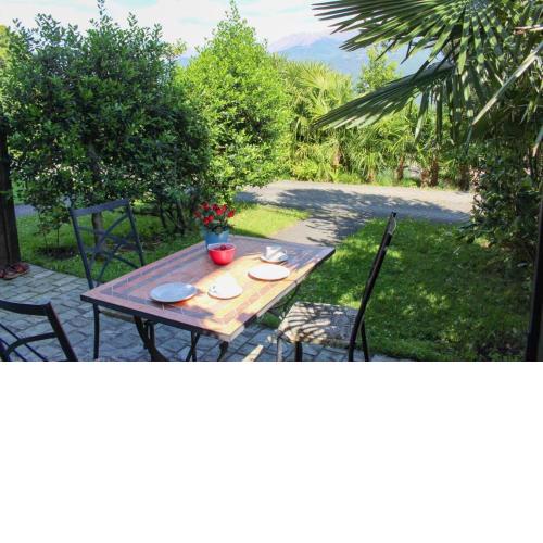 Carlo A Garten Ferienwohnung EG