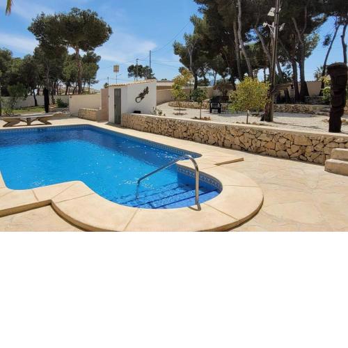 Casa Caledonia - Appartement au RDC d'une villa avec son jardin et piscine partagée à 400 M de la mer