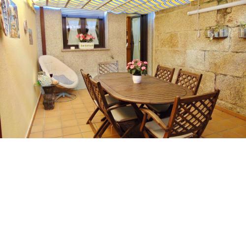 Casa centro o grove con terraza y asador