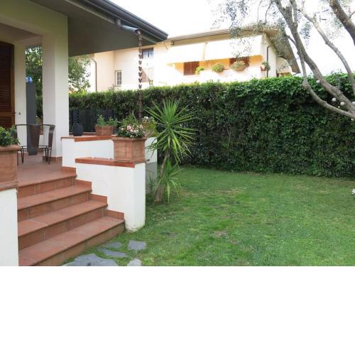 Casa con giardino