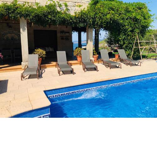 Casa da Lomba Piscina y vistas al mar en Baiona