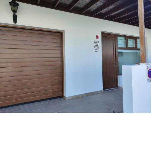 Casa de León. Barbacoa y garaje privado.