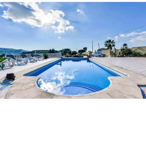 Casa de vacaciones con piscina compartida