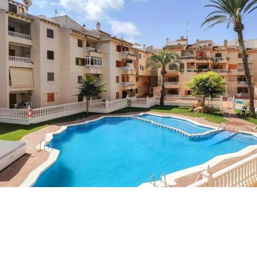 Casa Del Angel , Cosy apartment,200m from Playa Los Locos plus beautiful swimming pool
