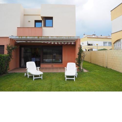 Casa l'Escala, piscina comuntària i jardí privat