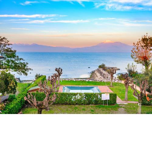 Casa Lugana 8 - monolocale con piscina fronte lago