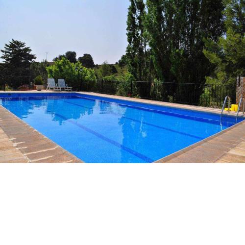 Casa rural El Salero Piscina campo de fútbol y voley chimenea barbacoa