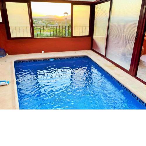 Casa rústica con piscina LA GRANÁ