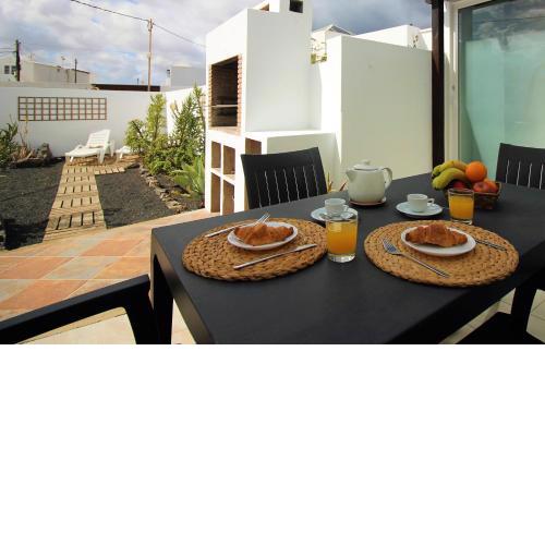Casa Tabaiba con jardín y barbacoa