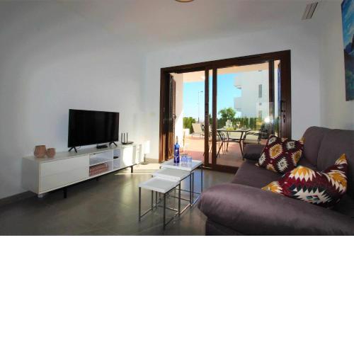 Casa Tapas y vino apartamento con jardin y piscina comunitaria