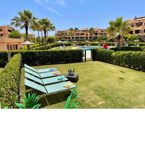 Casares Beach Golf Apartment with private garden and pool access